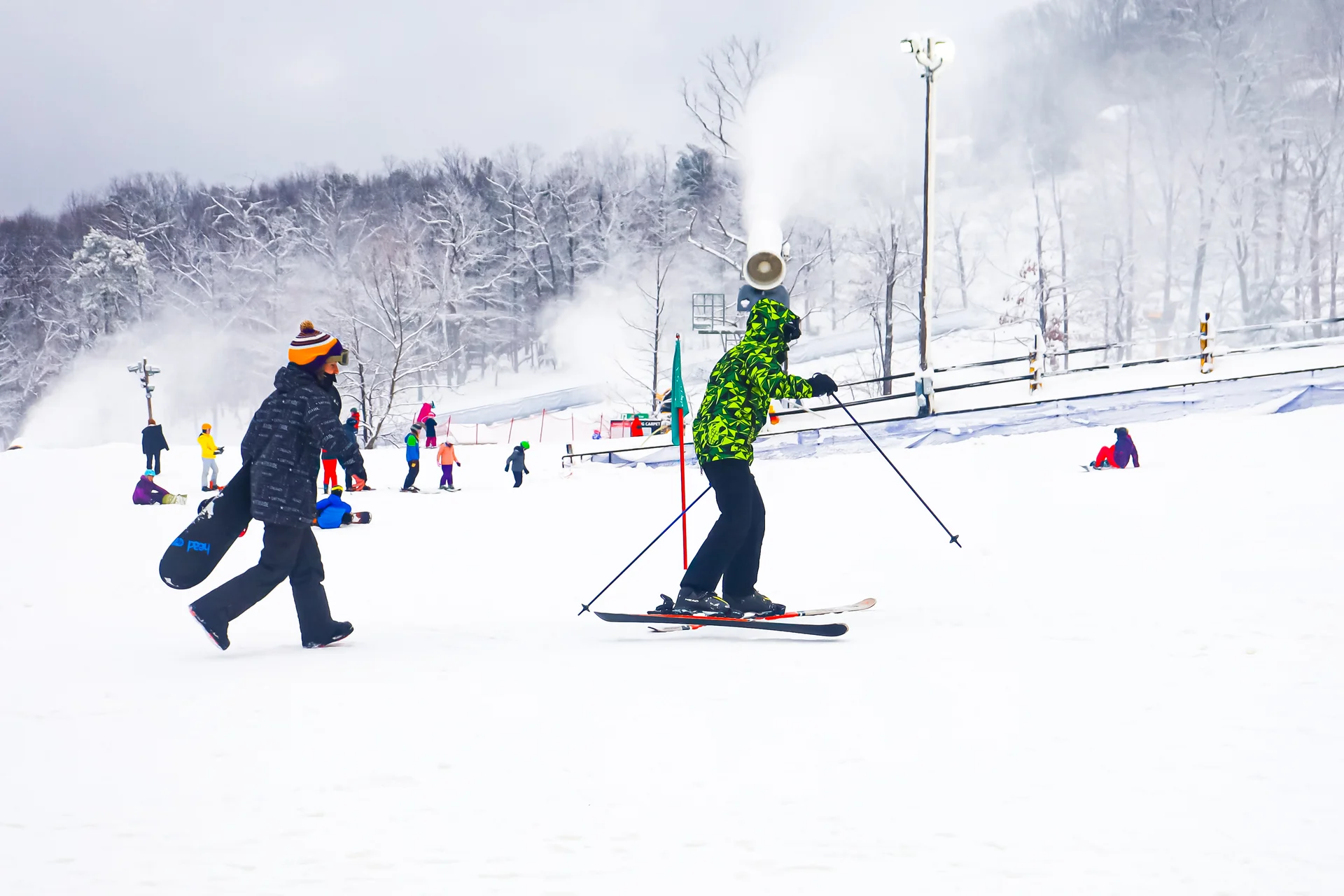 Massanutten ski area general skiers on snowy beginner slope 32