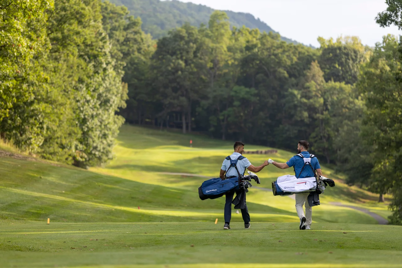 Massanutten mountain greens golfers fist bump mountain fairway wide