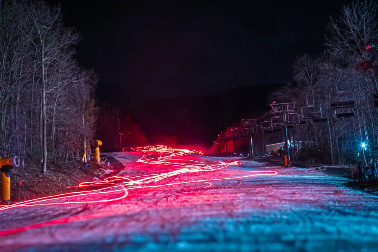 Massanutten snow moon festival night ski slope light trails
