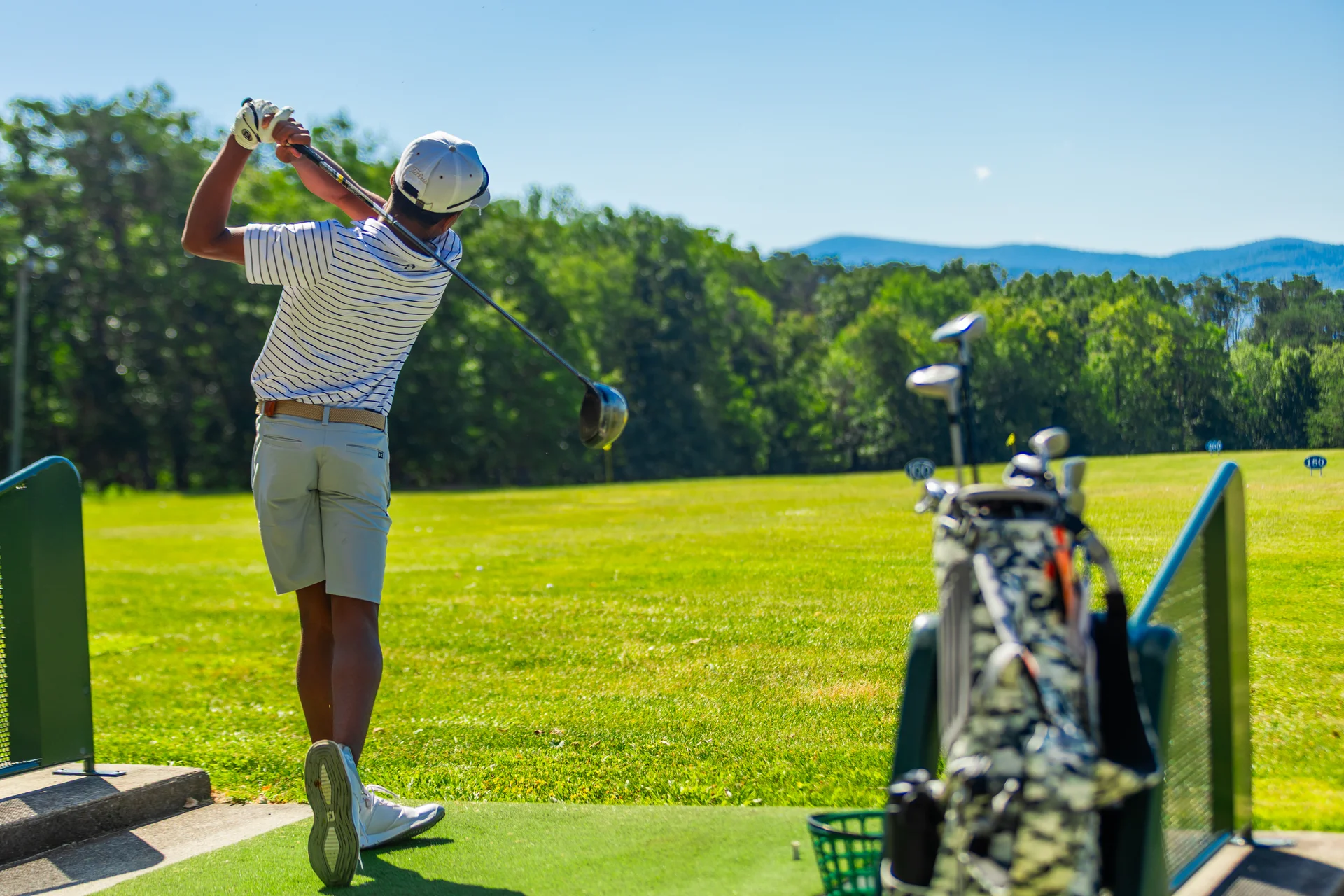 Massanutten golf driving range golfer scenic swing