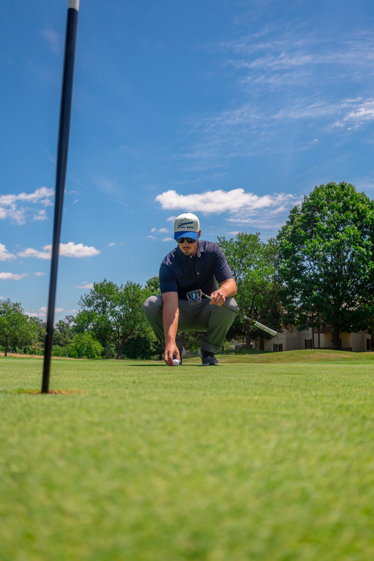 Massanutten woodstone golfer lining up putt