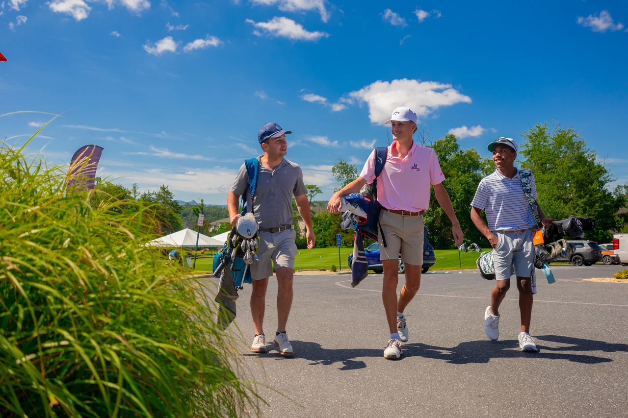 Massanutten woodstone golfers carrying bags