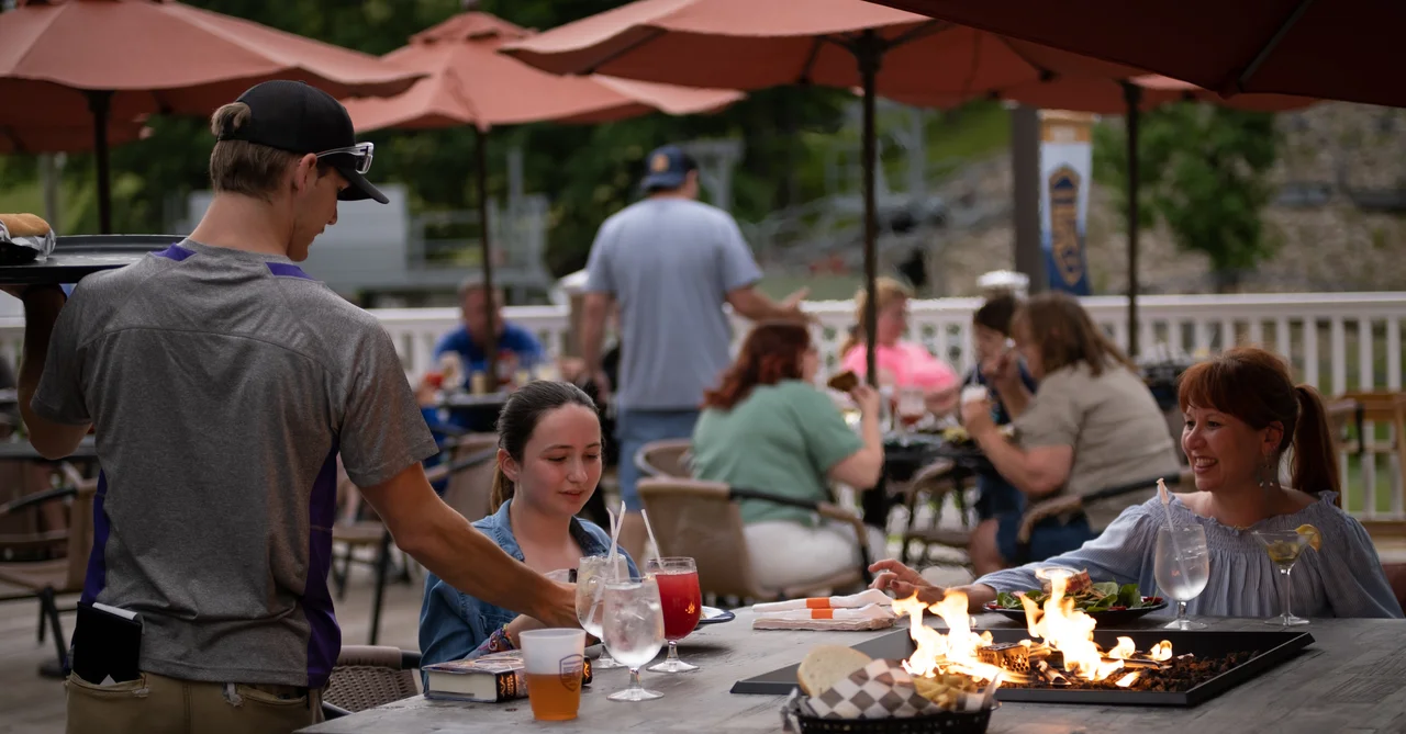 Massanutten base camp outdoor dining by fire table