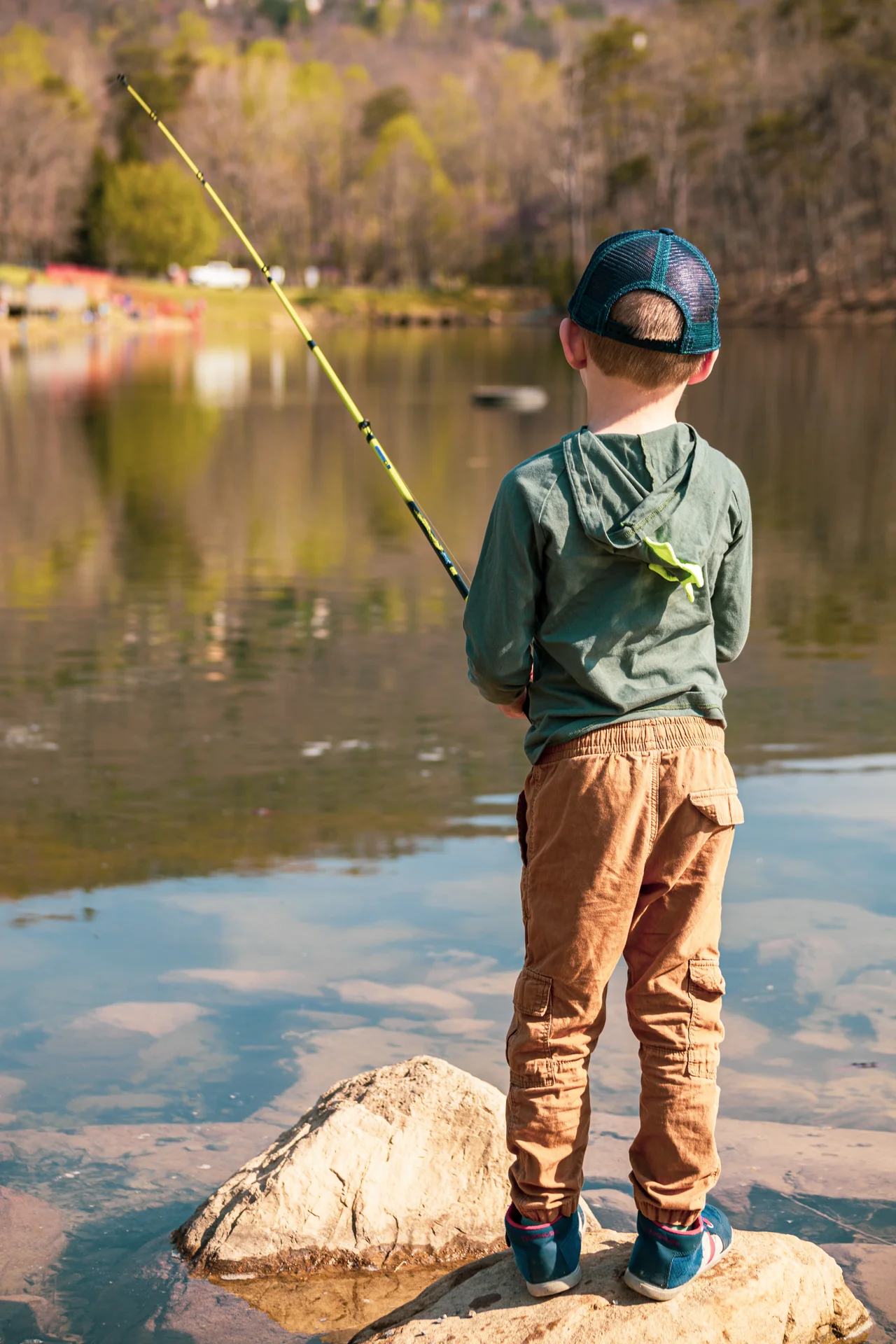 Massanutten fishing boy by pond