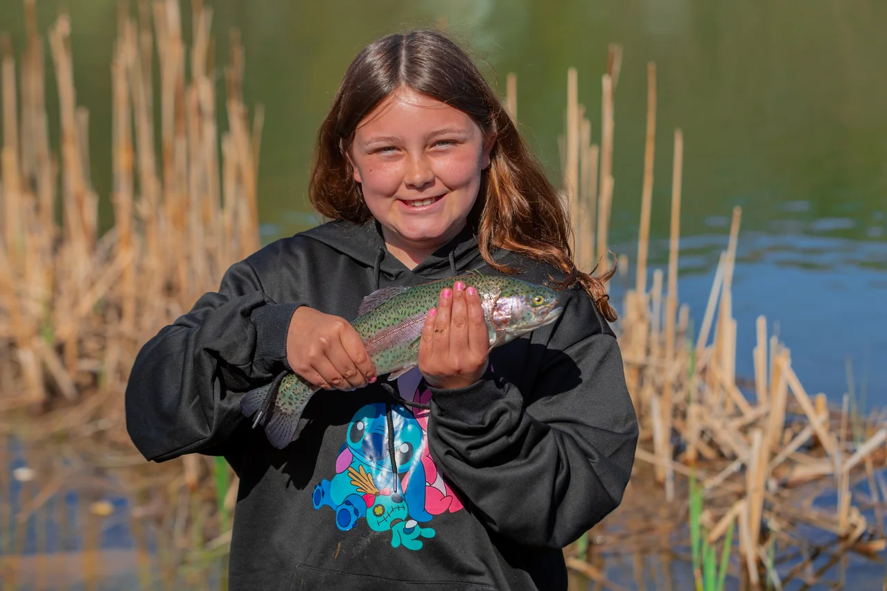 Massanutten fishing girl holding trout