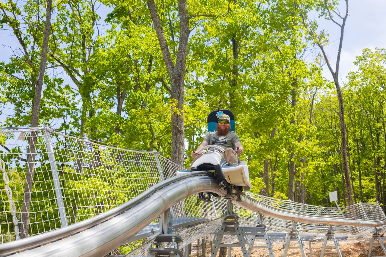 Massanutten fun coaster man riding elevated track