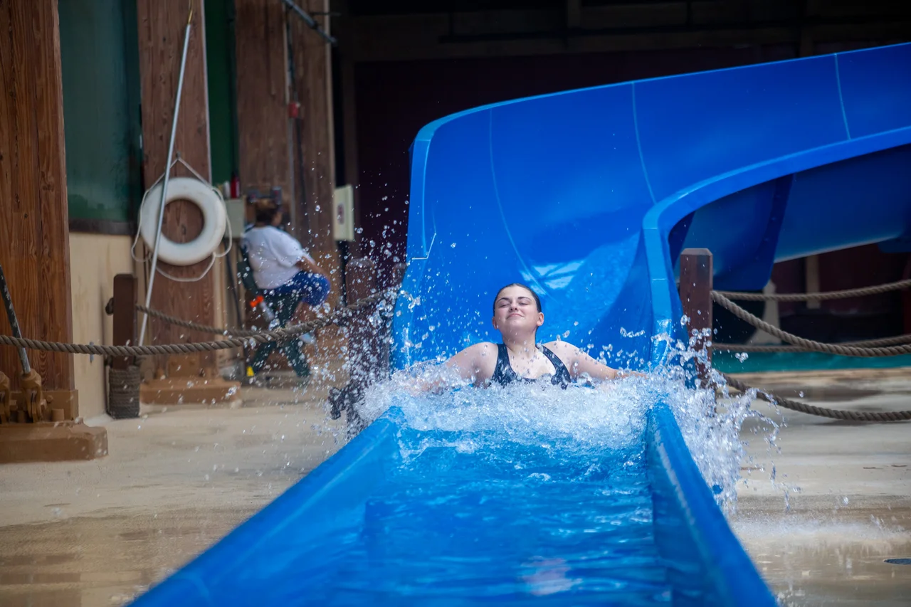 Massanutten indoor waterpark blue slide rider 28
