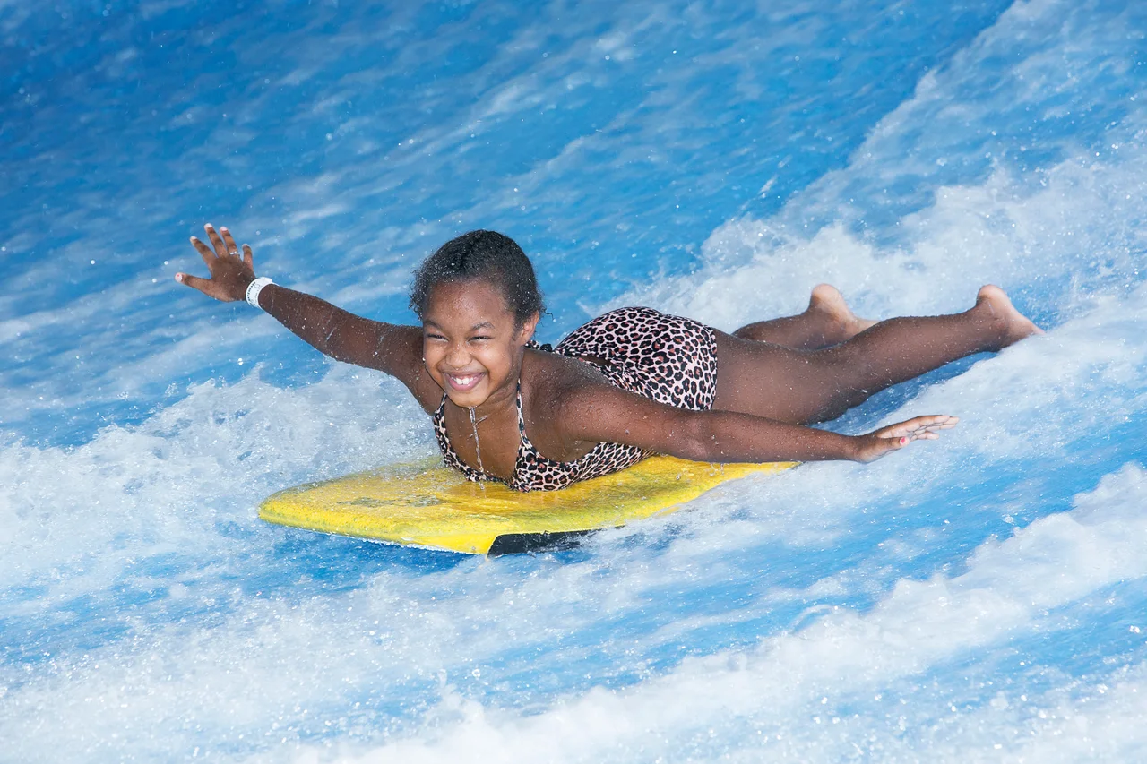 Massanutten indoor waterpark child bodyboarding 10