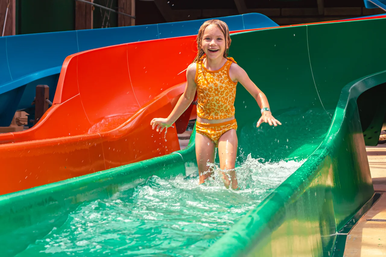 Massanutten indoor waterpark girl on water slide 18
