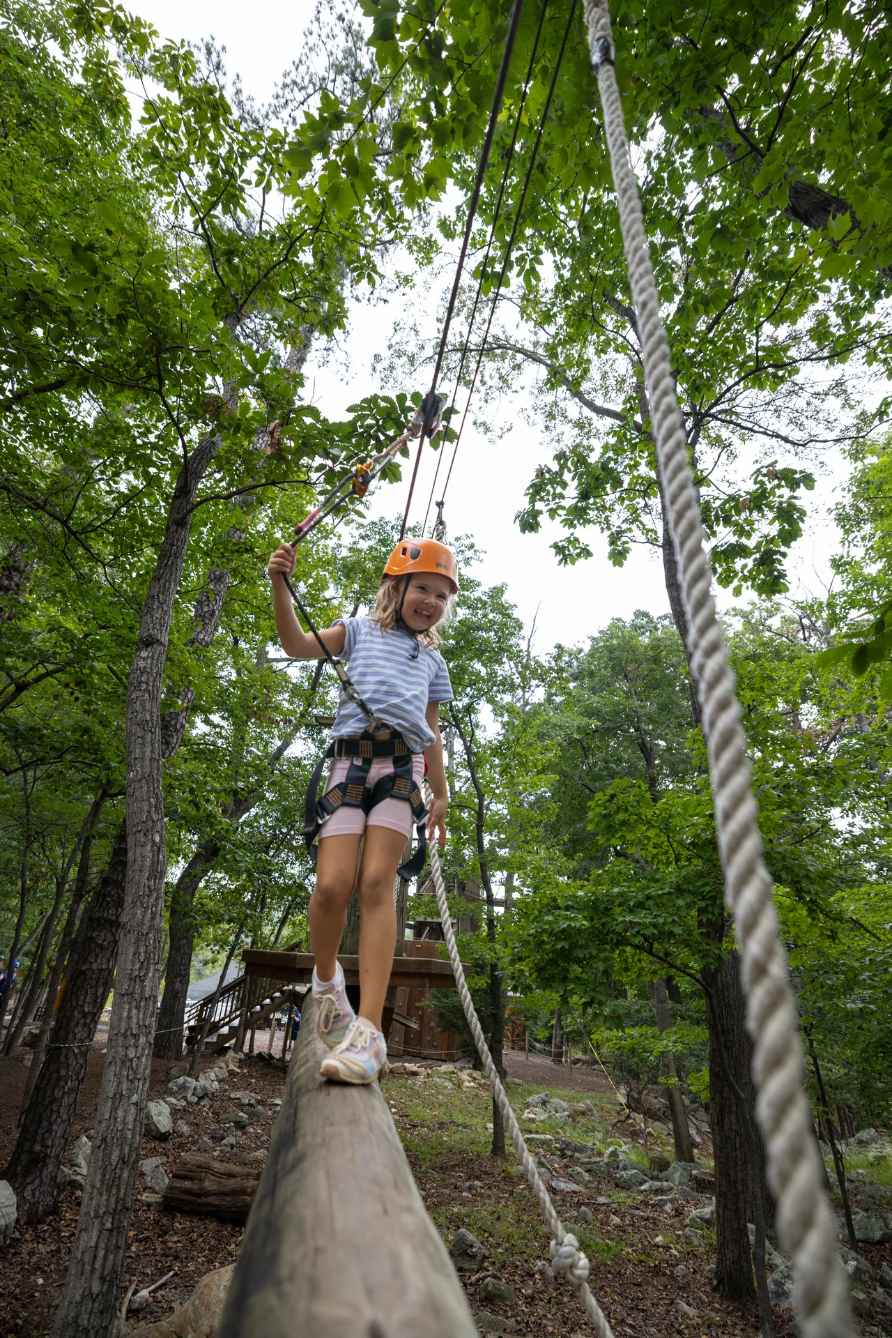 Massanutten kids adventure course girl balancing log bridge rope course