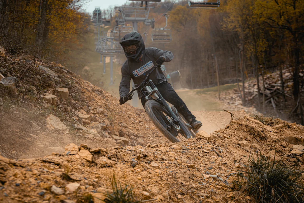 Massanutten mountain biking bike park mountain biker on downhill chairlift trail 06