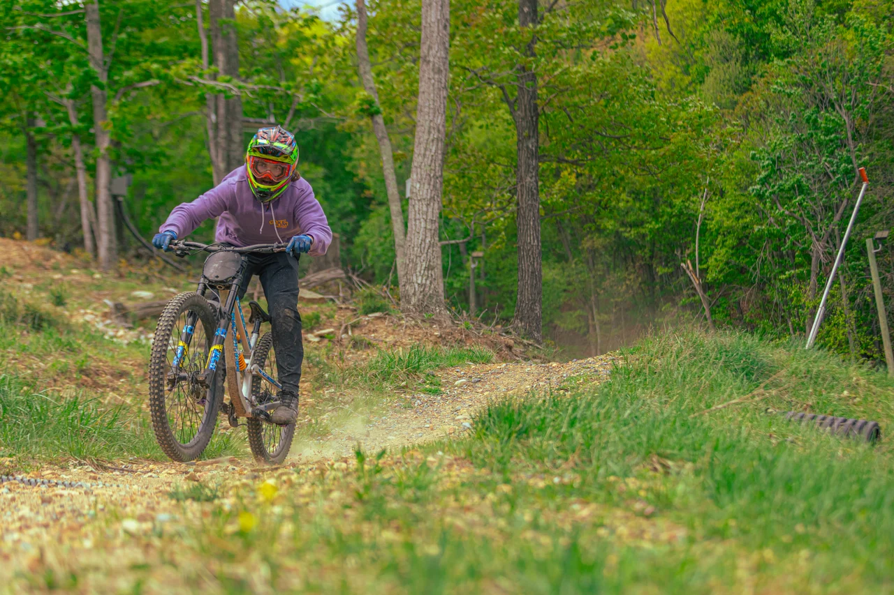 Massanutten mountain biking bike park mountain biker on forest trail 20
