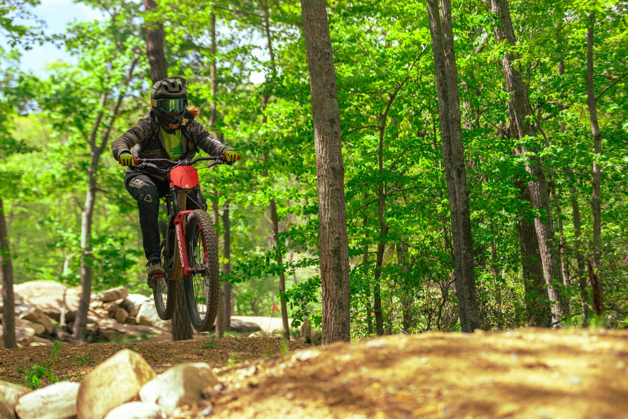 Massanutten mountain biking bike park mountain biker on forest trail 23