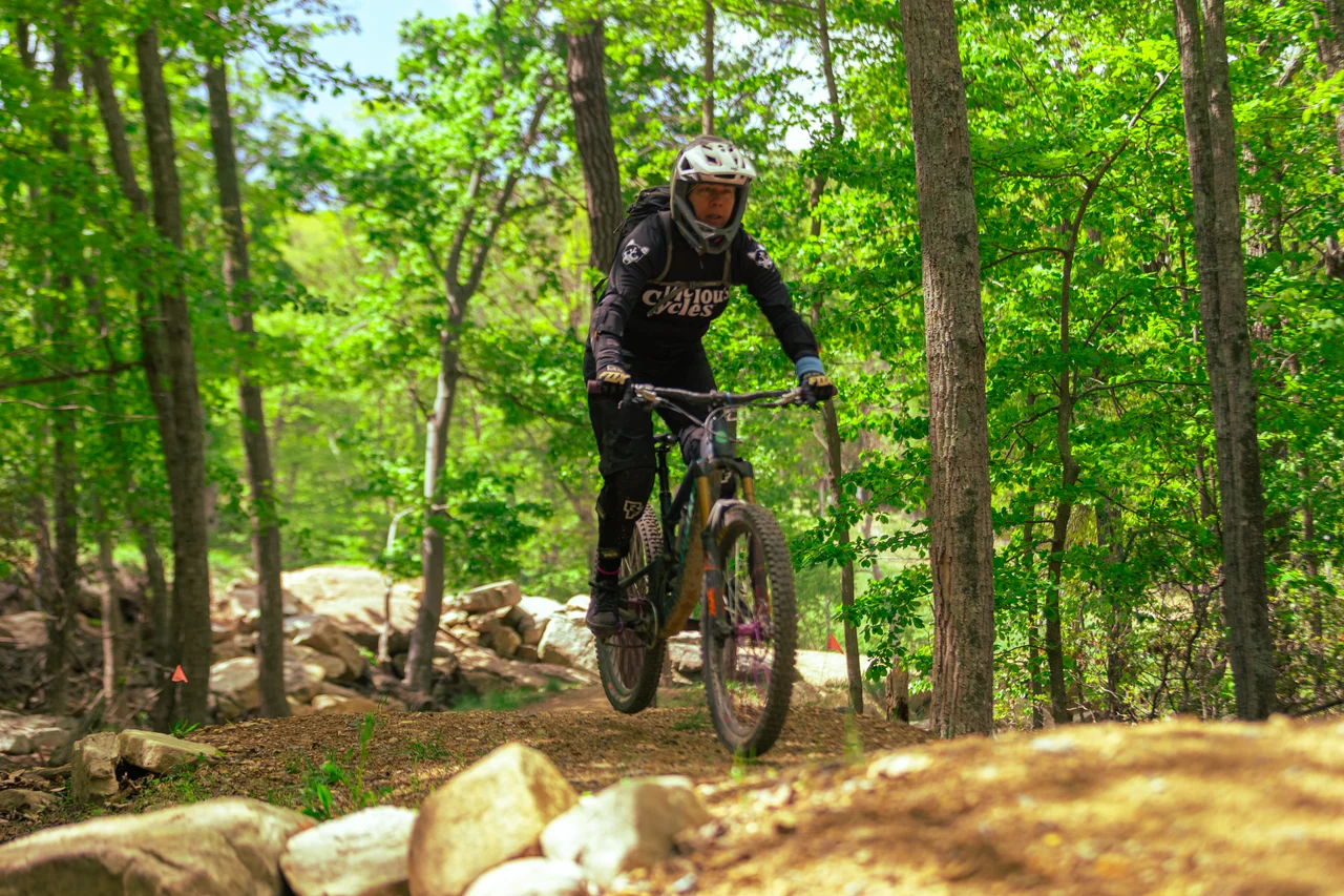 Massanutten mountain biking bike park mountain biker on wooded trail 24