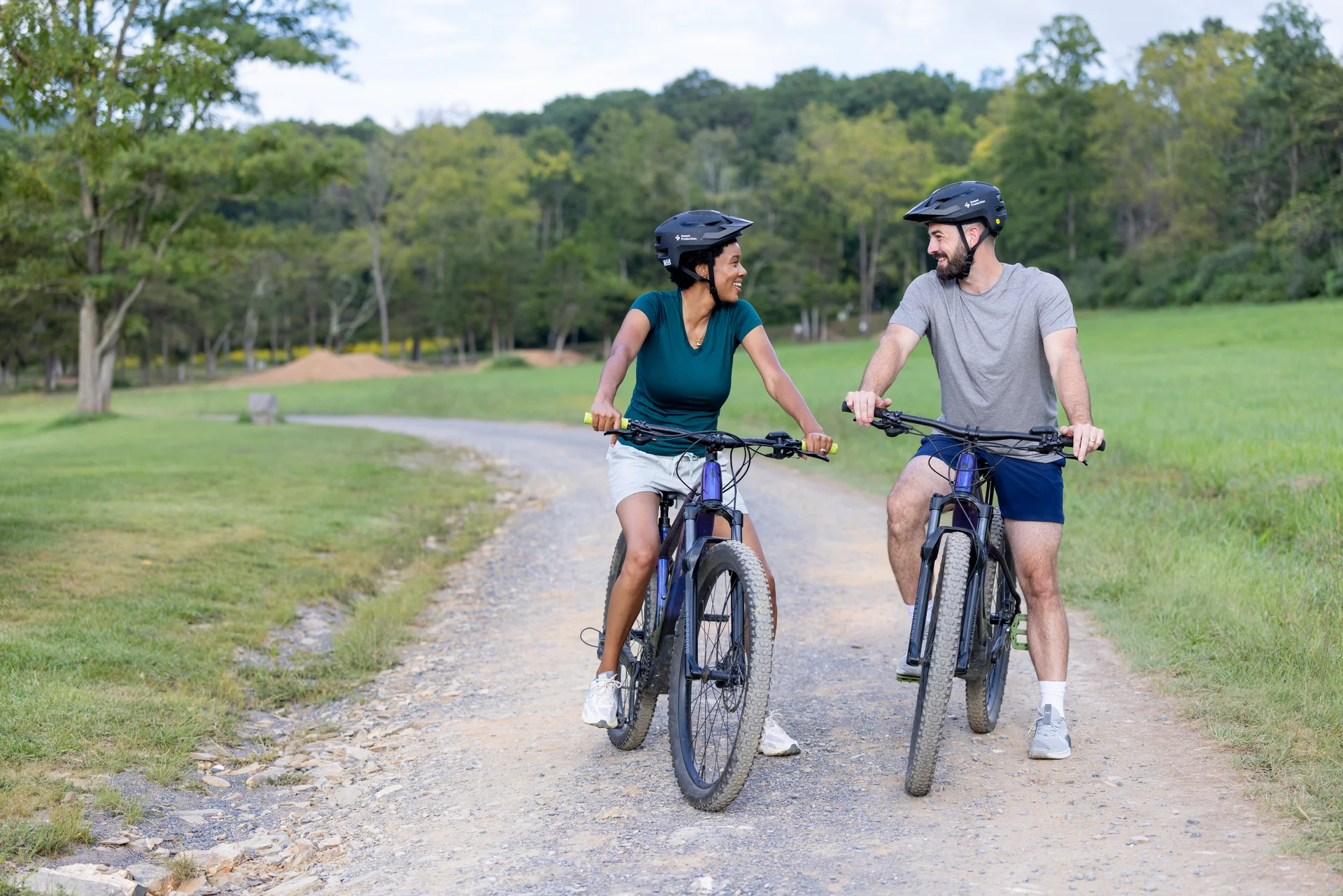 Massanutten mountain biking couple bikes gravel path summer