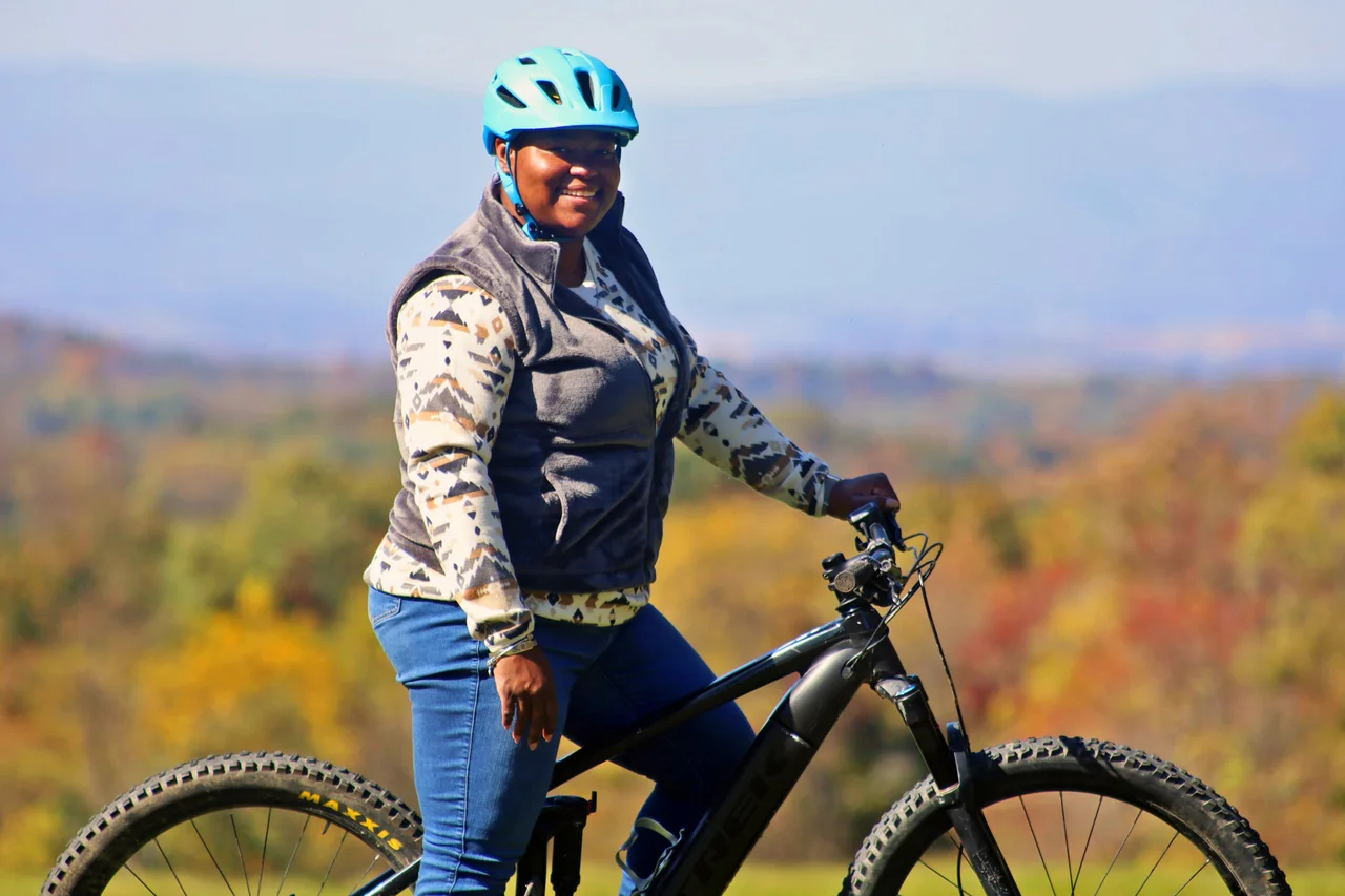 Massanutten mountain biking western slope woman riding ebike with mountain view 17