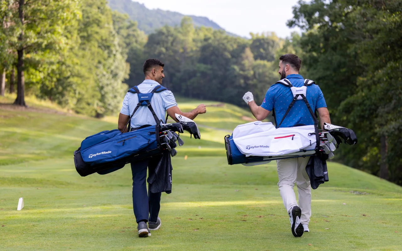 Massanutten mountain greens golfers fist bump walking fairway