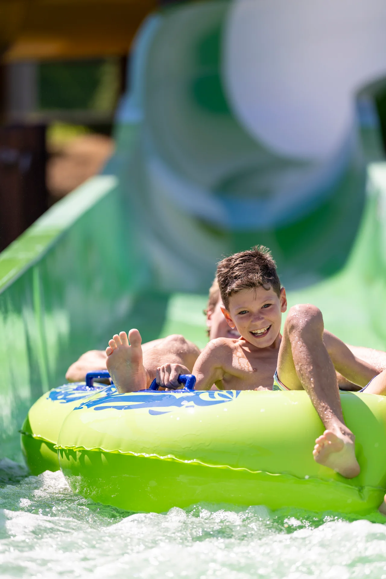 Massanutten outdoor waterpark peak plunge two riders green tube landing