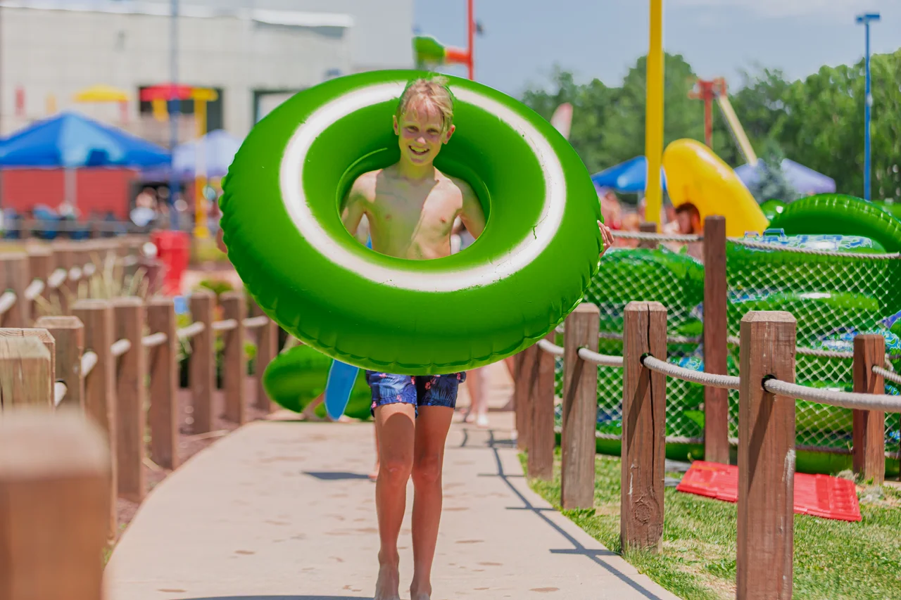 Massanutten outdoor waterpark rider on water slide 08