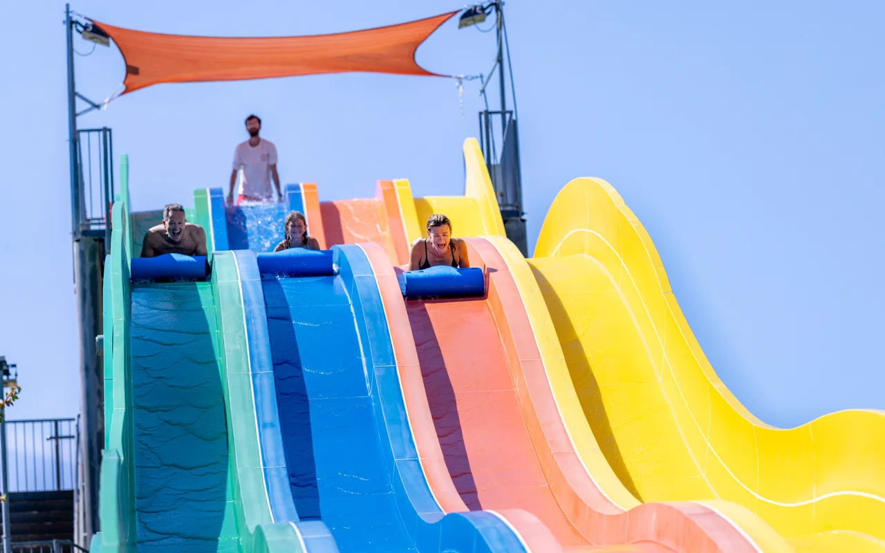 Massanutten outdoor waterpark rockingham racer three riders blue mats racing