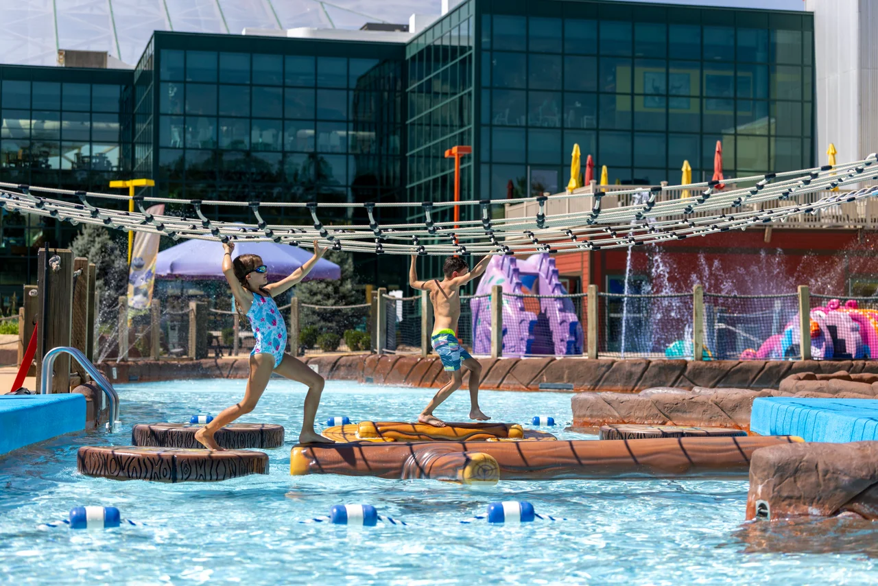 Massanutten outdoor waterpark splash a nutten children crossing floating logs
