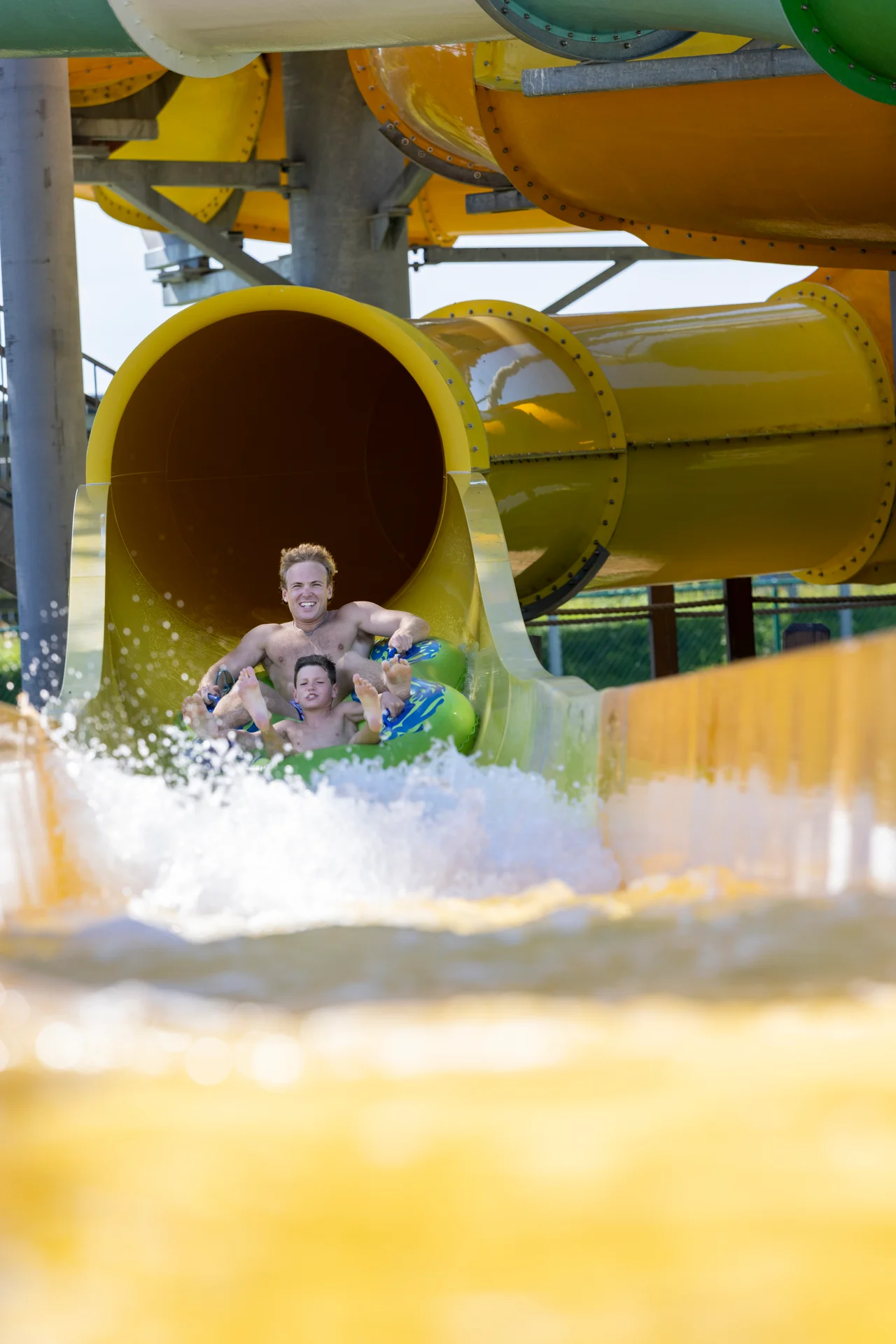 Massanutten outdoor waterpark valley vortex green tube yellow slide splashdown