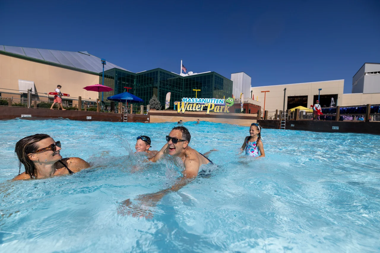 Massanutten outdoor waterpark white caps family swimming sunny day