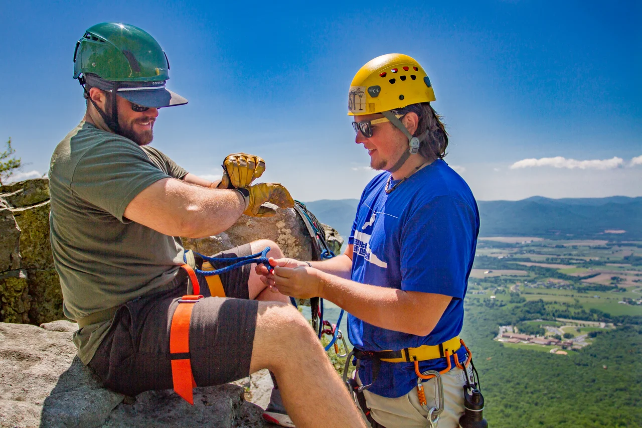 Massanutten ridge rappel guide securing climber