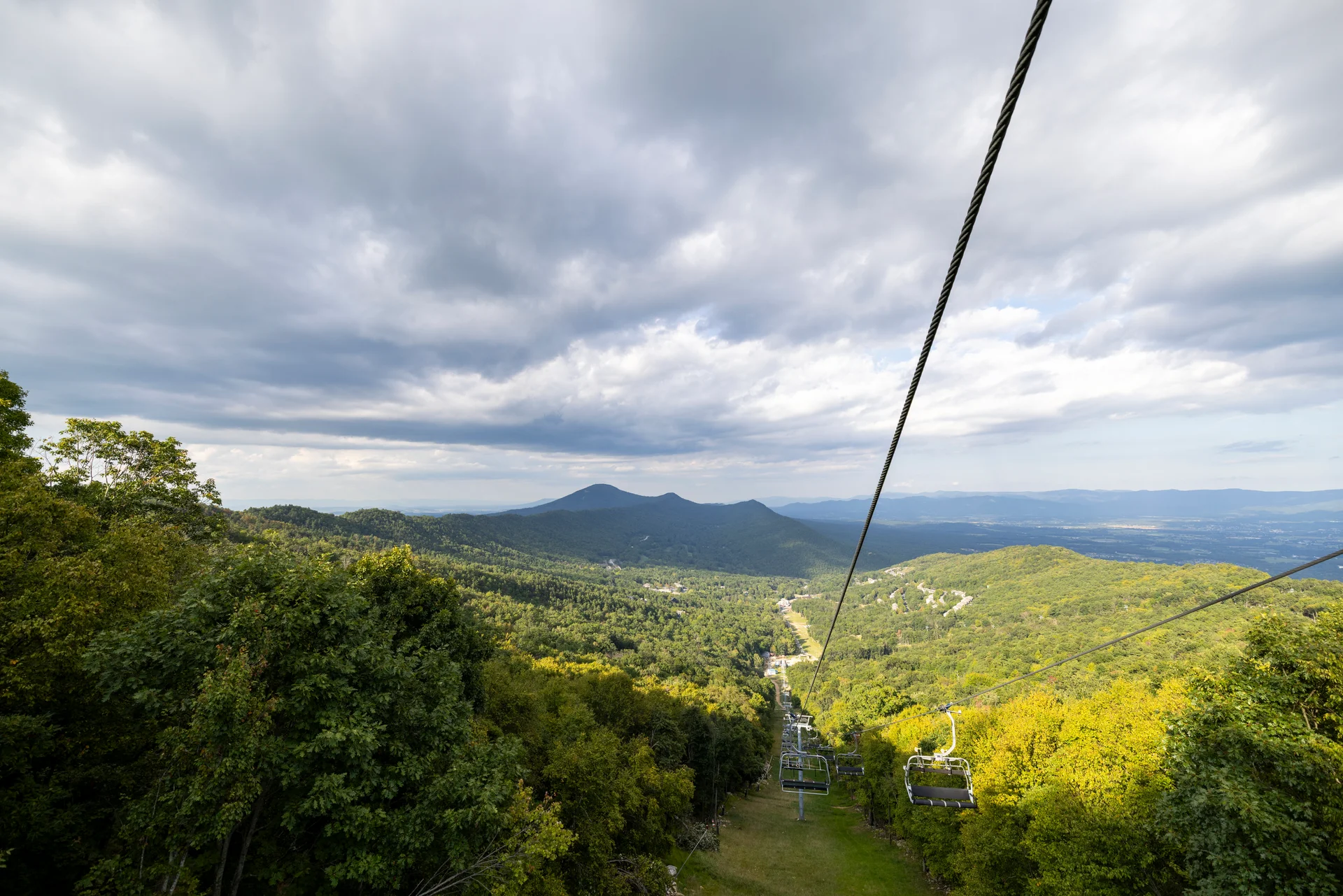 Massanutten scenic chairlift spring summer forested valley cloudy sky