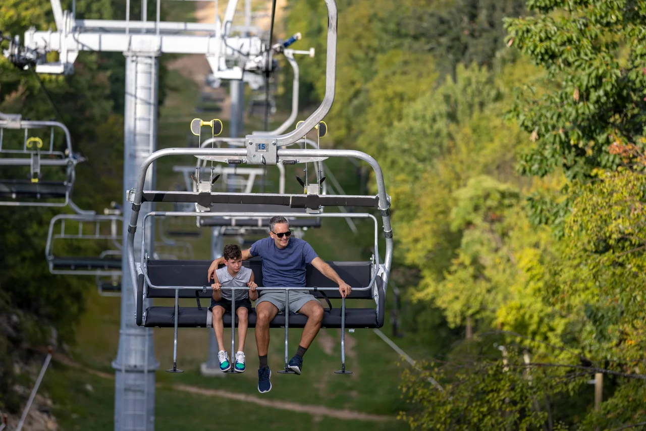 Massanutten scenic chairlift spring summer man boy green summer slopes