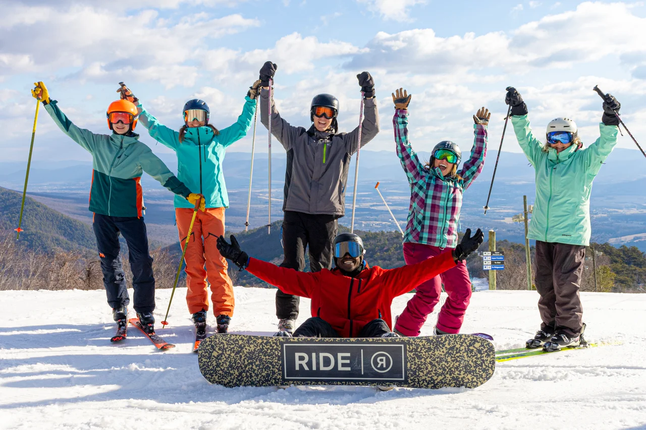 Massanutten ski area general ski group celebrating on snow 33